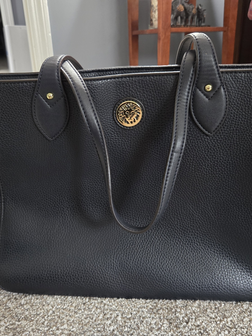 Anne Klein Black Pebbled Leather Tote with Gold Medallion